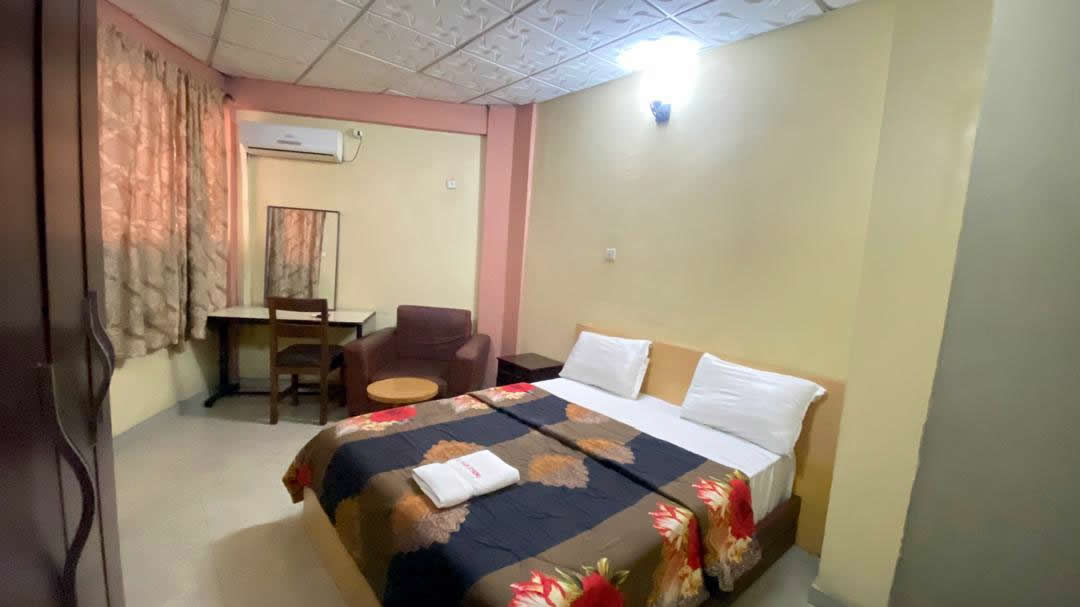 Single Room — bed, desk and seating