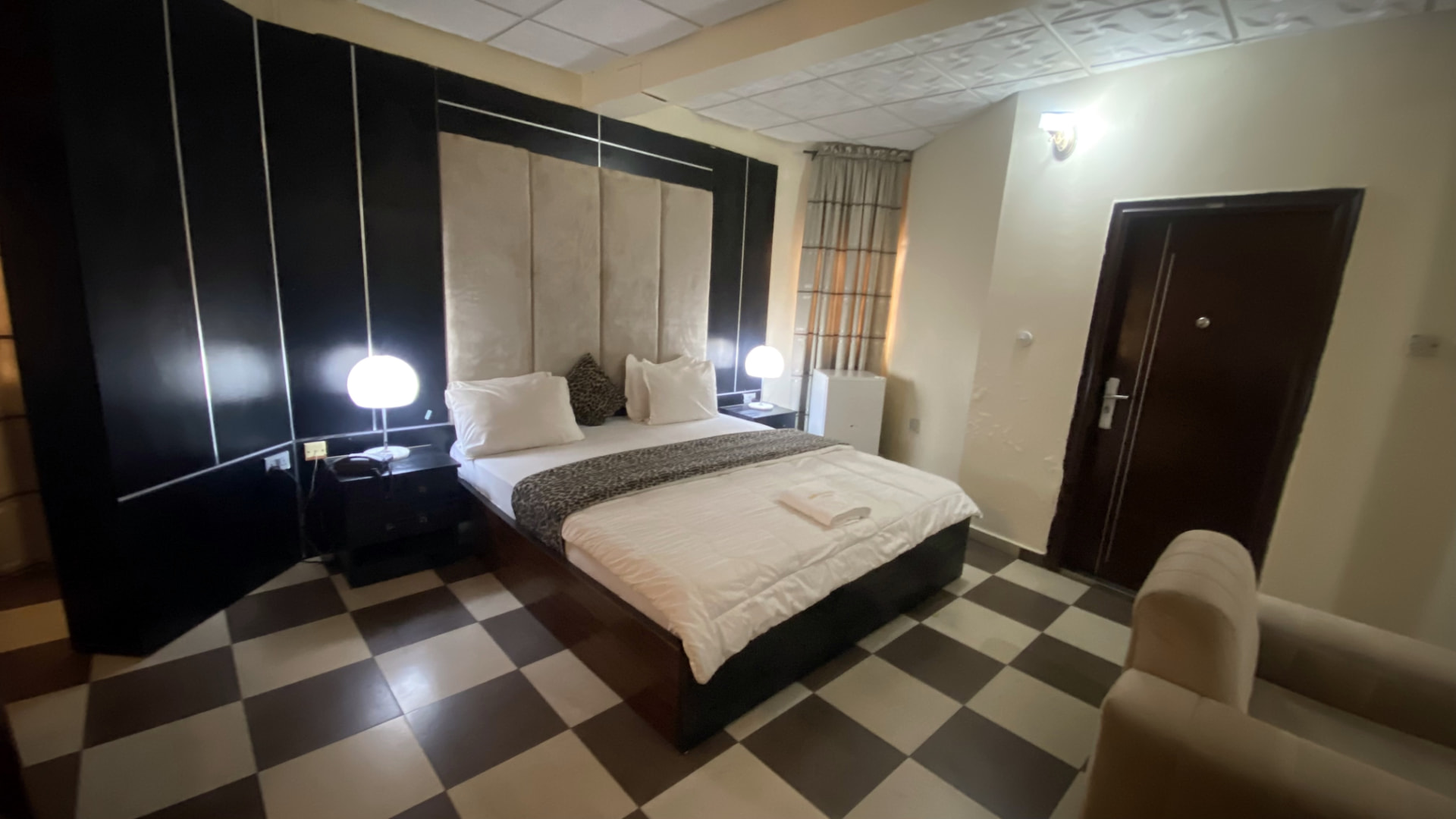 Executive Room — feature wall and wardrobe