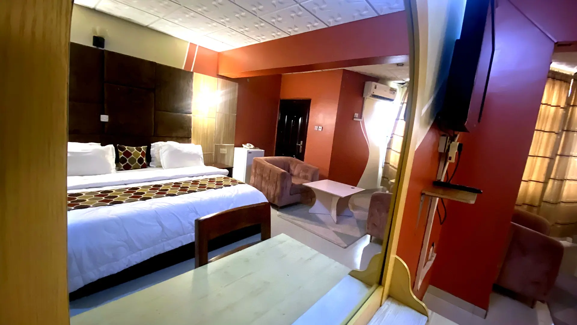 Suite — bedroom and living space