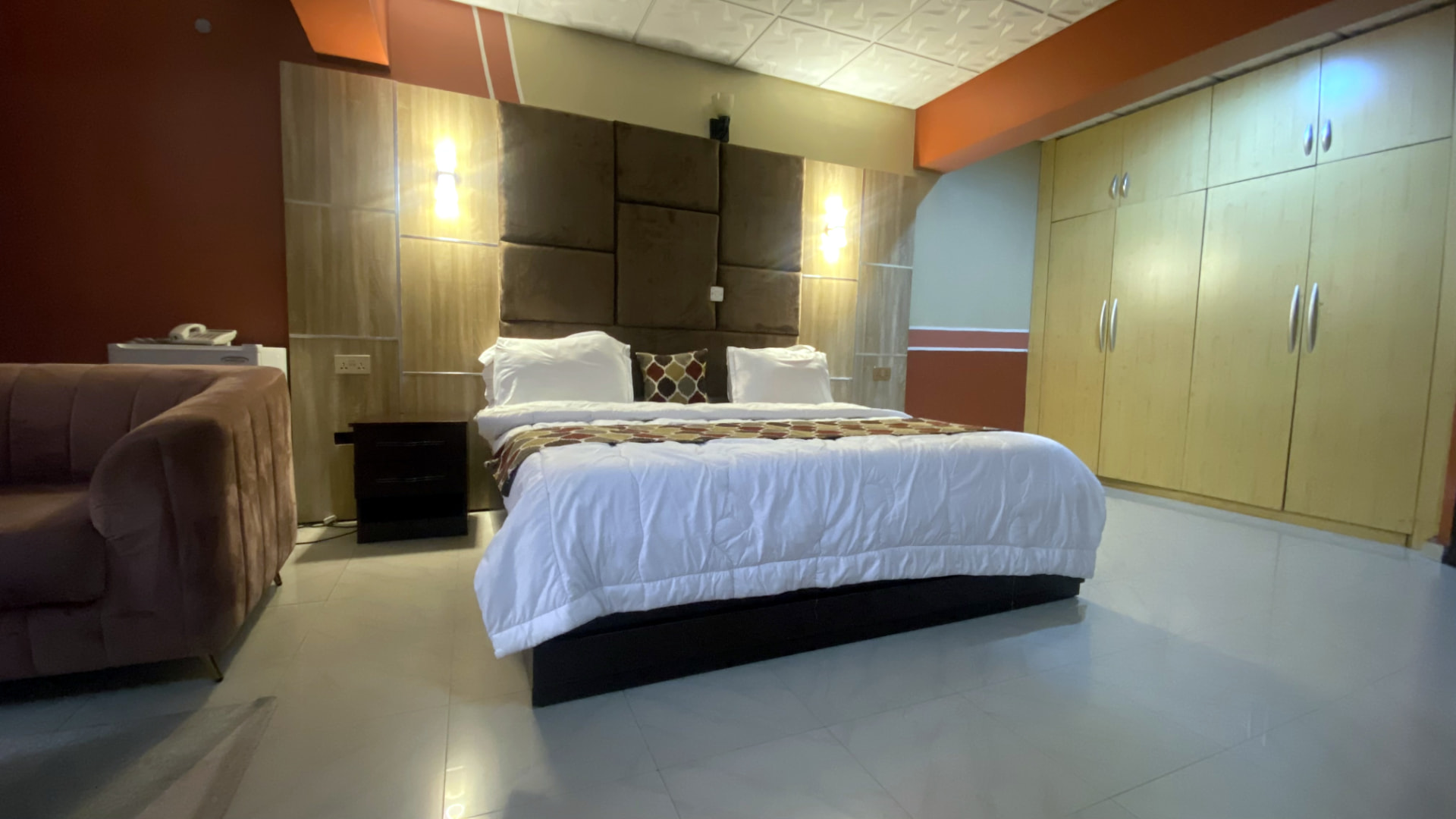 Guest room — wardrobe and armchair