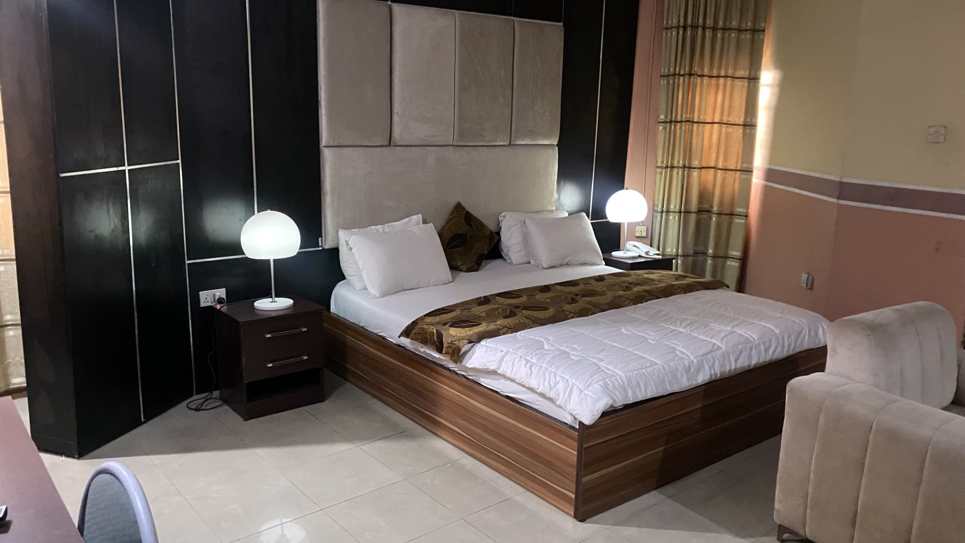 Guest room — black feature wall
