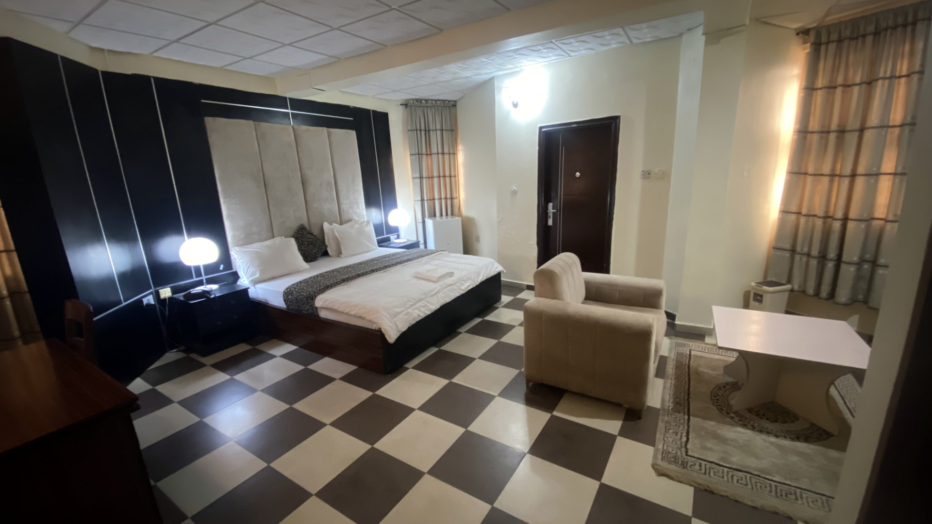 Executive Room — bright bedroom and lounge